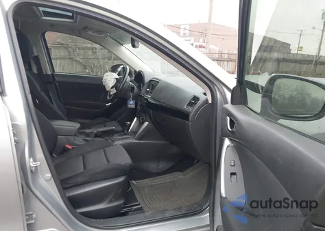 2013 Mazda Cx-5 Touring z USA, uszkodzony, nr VIN JM3KE2CE7D0120615